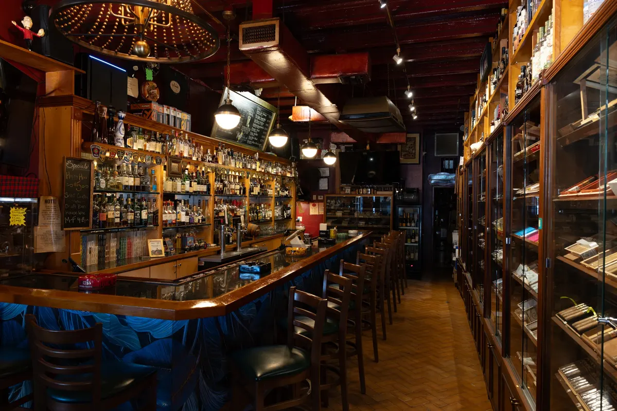 The full bar and walk-in humidor inside Macabi Cigar Bar