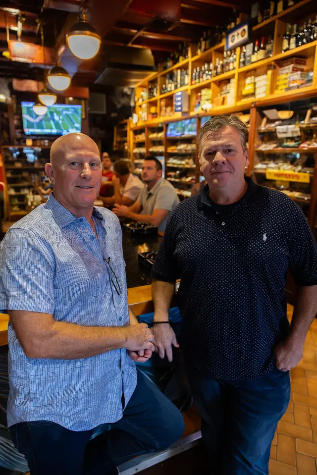 Macabi owners Mike and Jim inside the cigar bar